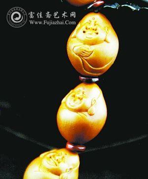 橄榄核：把玩手腕上的文化