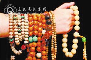 一颗蜜蜡老珠三年涨价9倍多 珠子假货居多